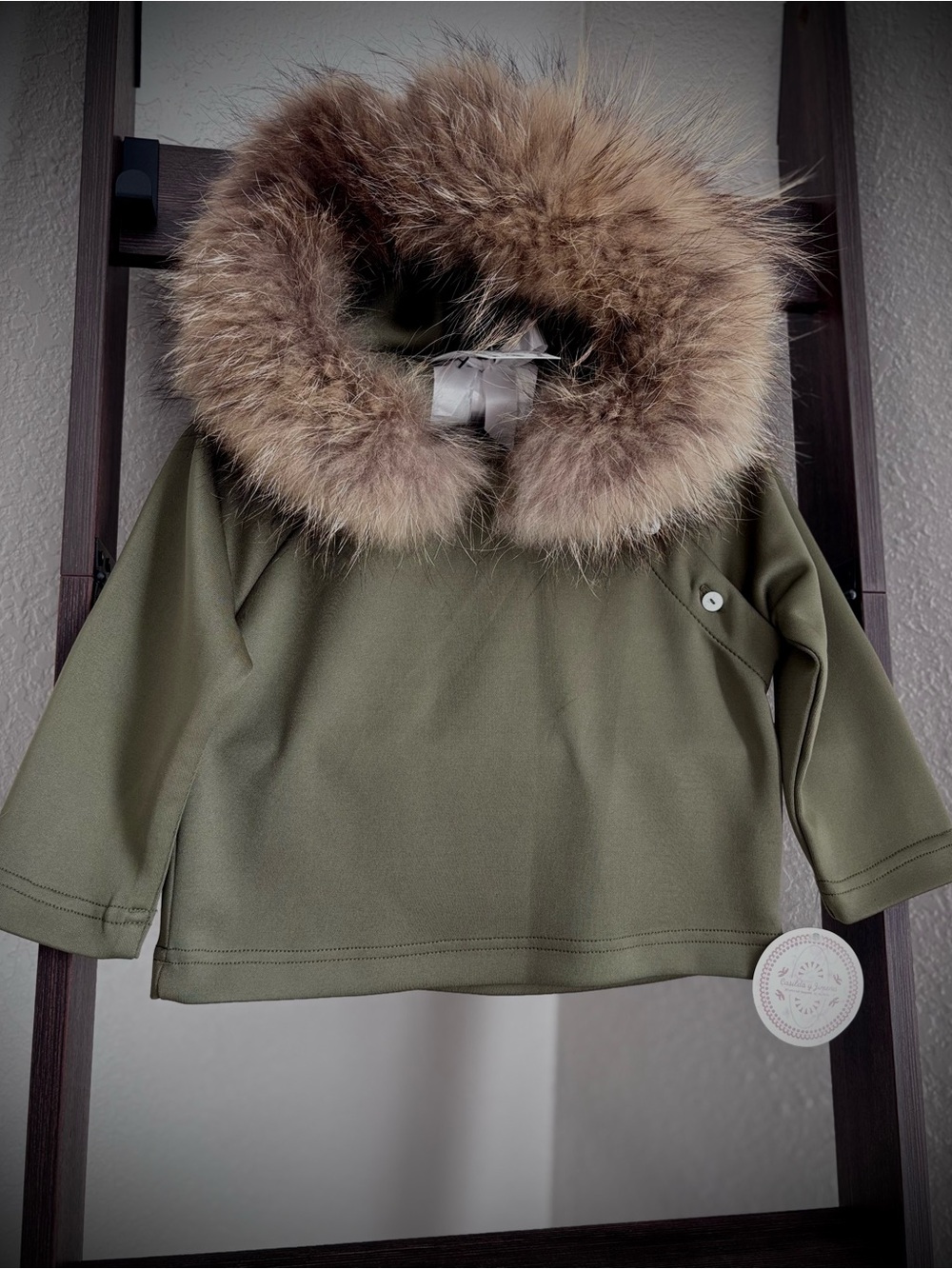 Olive green baby sweatshirt prestigious Spanish luxury brand Casilda y Jimena